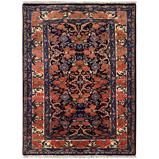 Rectangular rug with a dark blue-red ornamental pattern and border, 142×102 cm