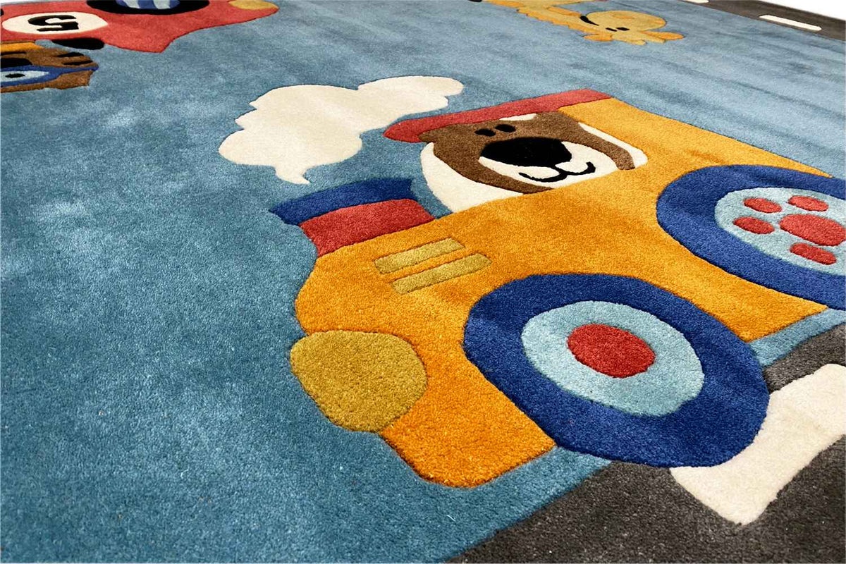 Hand-tufted rug 170x240 cm: close-up of an astronaut figure in orange/blue on blue