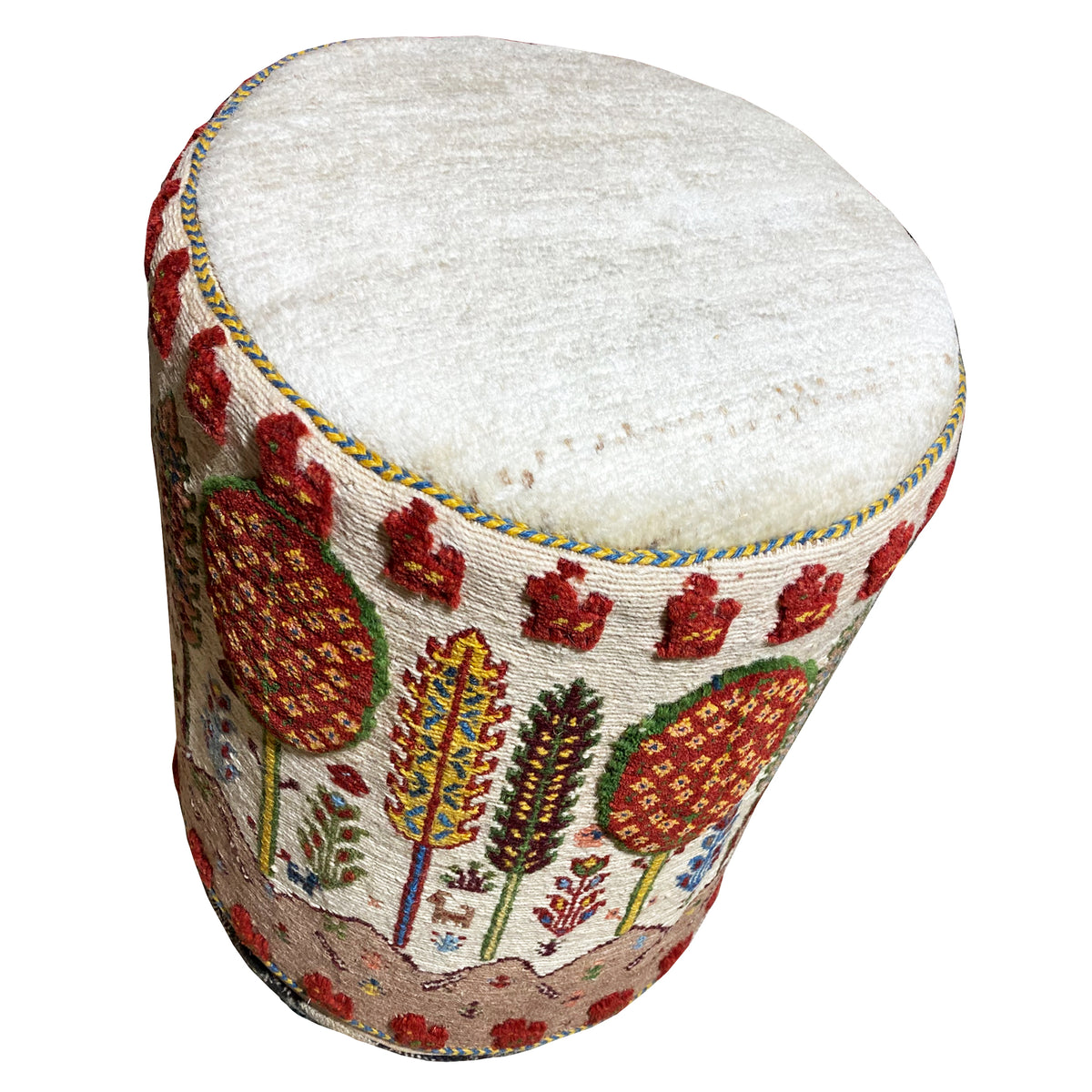 Colorful Soumakh stool with a round seat cushion, colorful embroidery on the cover, side view
