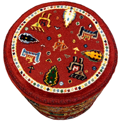 Round stool with a red Soumakh pattern, colorful embroidery on the upholstered seat