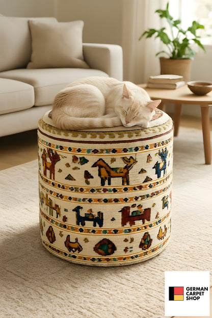 Round patterned stool with a padded lid and ethnic ornaments, cream