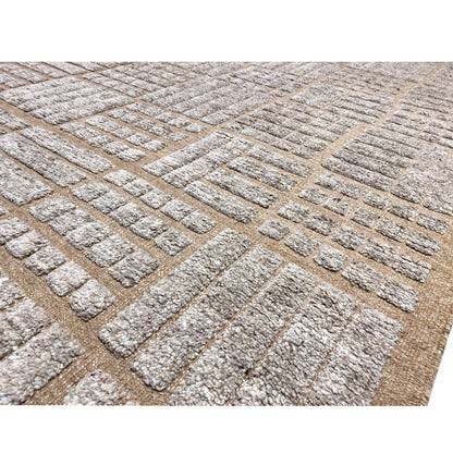 Carpet surface with patterned fabric and raised relief textures in brown and beige
