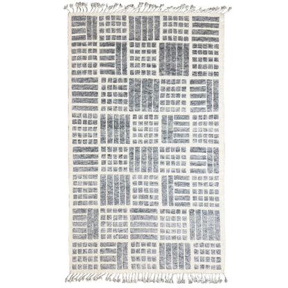 Gray Berber wool rug with a geometric pattern and fringes along the edges