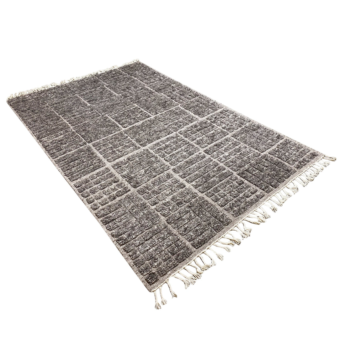 Flat-woven Berber rug with a diamond grid pattern in dark gray and white fringes