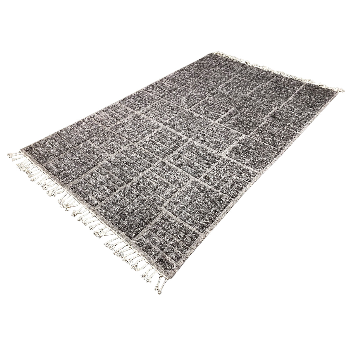 Slanted rectangular Berber rug with a diamond pattern in dark gray and white fringes