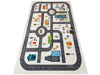 Kinderteppich mit Straßenmotiv: Gebäude, Ampeln und Fahrzeuge auf hellem Grund