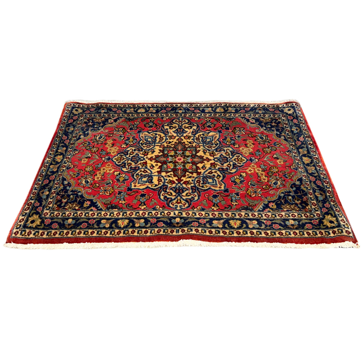 Rug front view: red ornamental pattern, dark blue border, clean bound edges