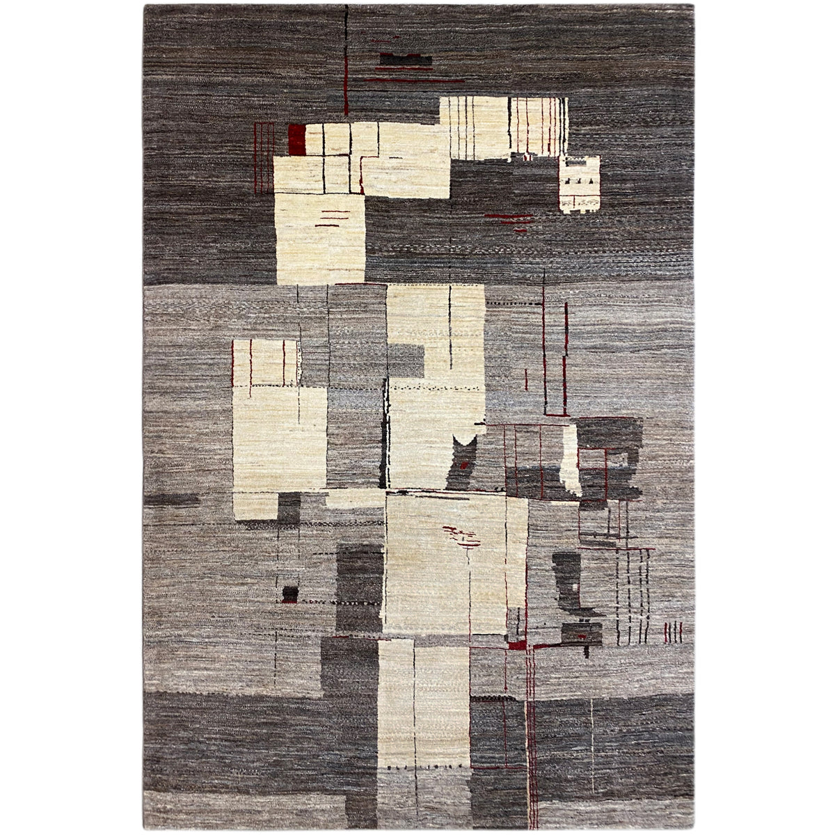 Gabbeh rug with an abstract patchwork pattern in gray, beige, and dark accents