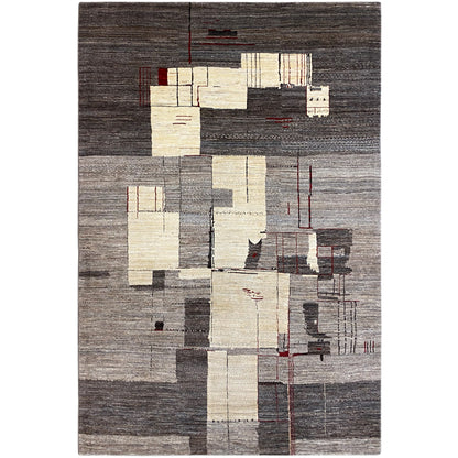 Gabbeh rug with an abstract patchwork pattern in gray, beige, and dark accents