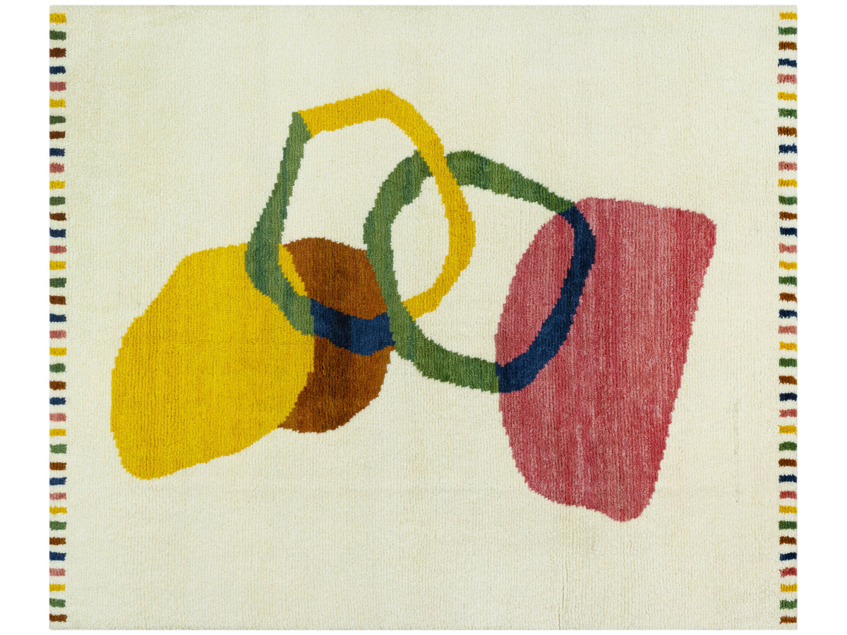 Teppich mit abstrakten Farbformen in Gelb, Grün, Rot und Blau, bunter Randfries