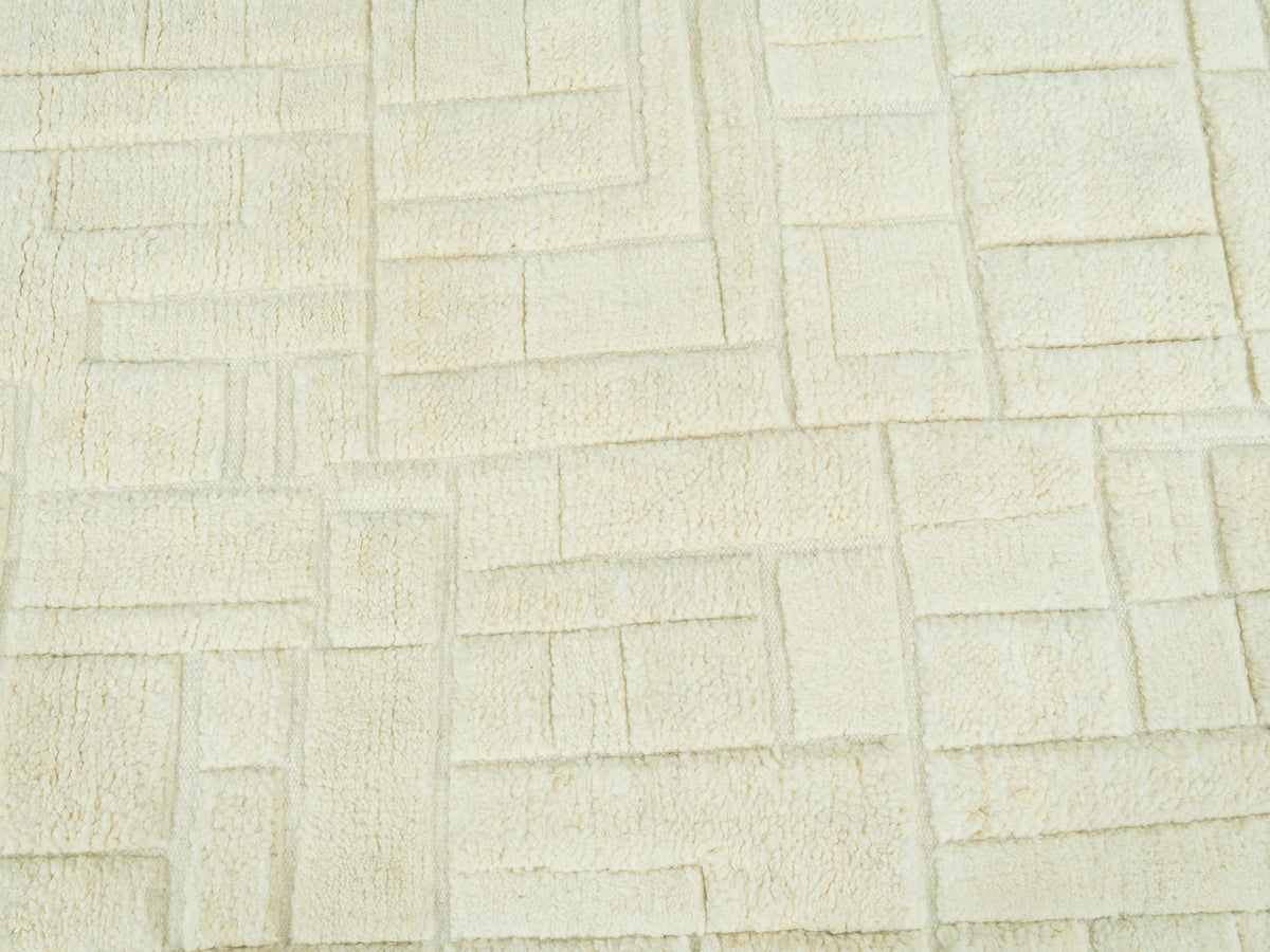 Oberflächenstruktur Teppich 300x250 cm creme mit wiederholtem Ziegelmuster