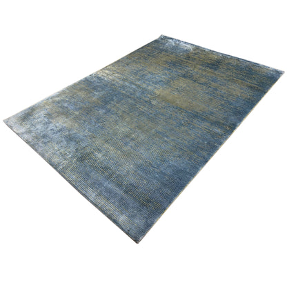 Designer rug, blue-gray patterned with golden longitudinal lines, rectangular
