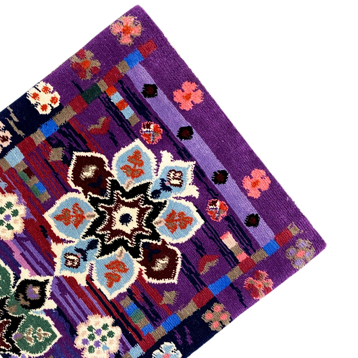Carpet 77x62 cm corner with purple border and multicolored medallions