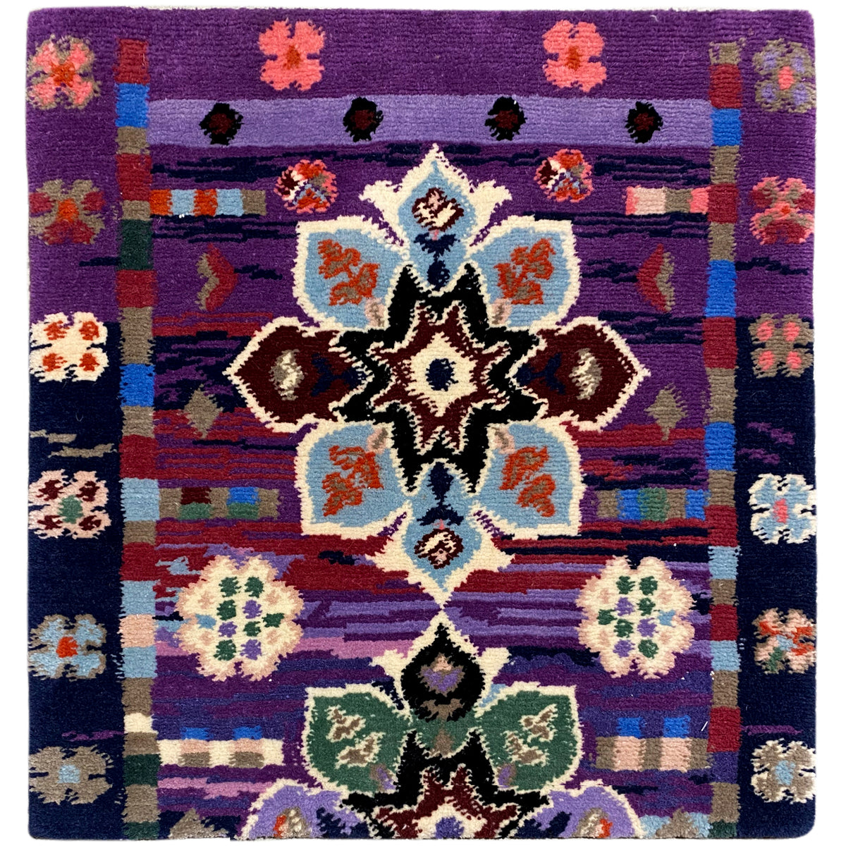 Rug 77x62 cm with a purple background and multicolored ornamental pattern
