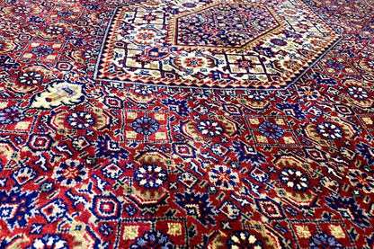 Bidjar rug detail: dense blue-red-white ornamental pattern