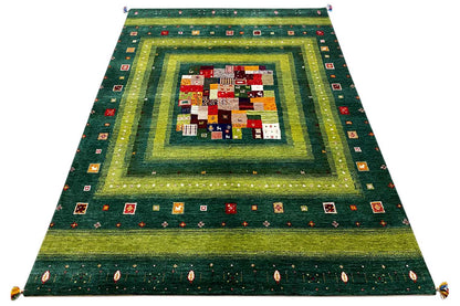 Gabbeh Lori rug, flat-woven, with a green-yellow border and colorful decorative elements