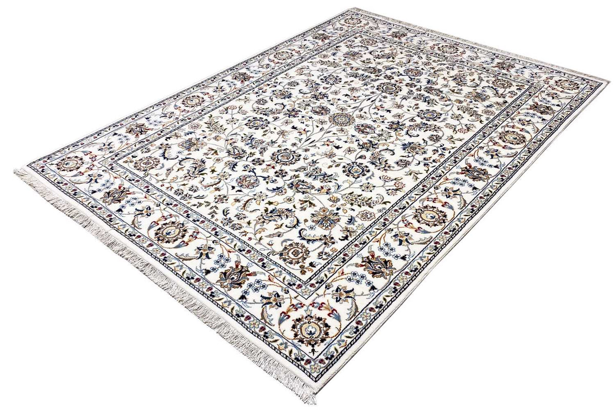 Beige rug with a finely detailed floral pattern, border trim, and fringes