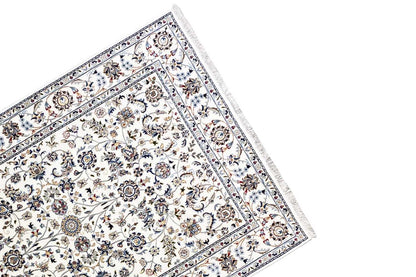 Beige carpet with a border along the edge, circular medallions, and floral vines
