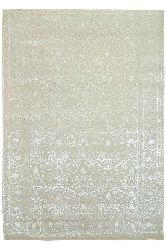 Light beige carpet with a fine damask pattern and a narrow border all around.