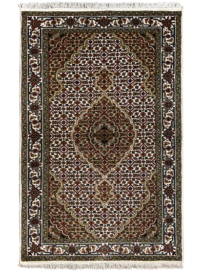 Indo Tabriz rug, rectangular: central medallion with delicate brown/green ornamentation