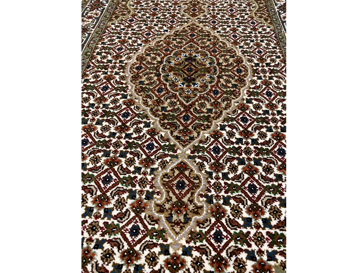 Indo Tabriz rug with medallion pattern, multicolored