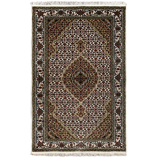 Indo Tabriz rug, rectangular: dark brown/green with a white ornamental border