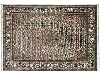 Indo Tabriz rug with a large medallion, beige-brown ground, and delicate ornamental border