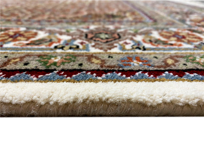 Indo Täbriz rug, detailed border and fringe, beige pile, color accents