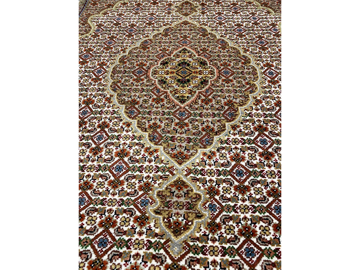 Indo Tabriz rug from above, central medallion, brown-beige, pattern clearly visible