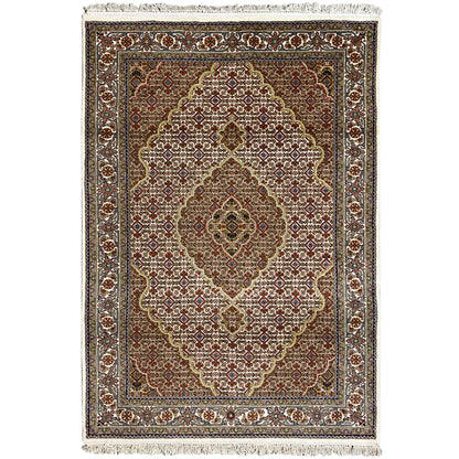 Indo Täbriz rectangular rug with an ornamental medallion, brown and beige, with fringes