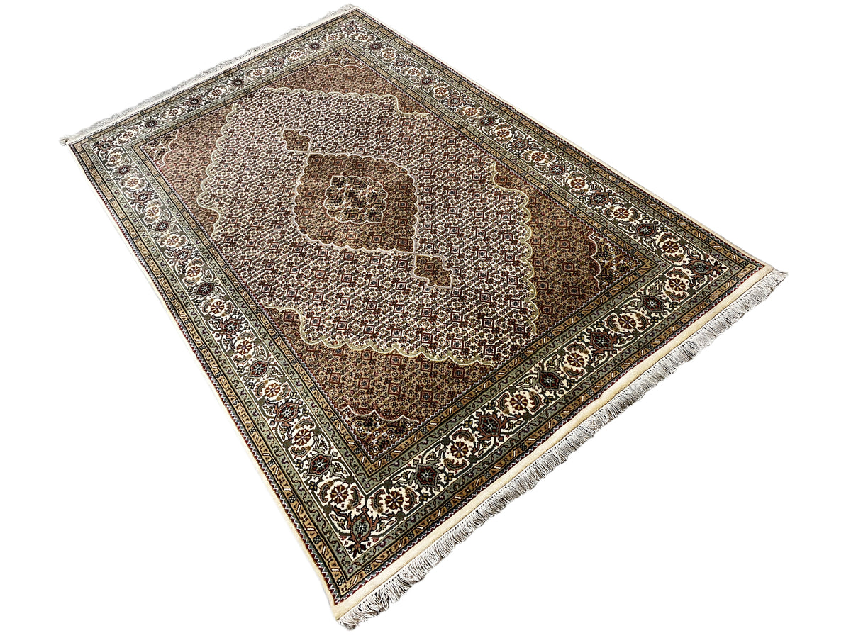 Indo Tabriz rug with fringes, twisted layout, brown and cream-colored pattern