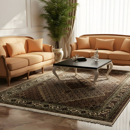 Large patterned rug, dark green with beige ornaments and border