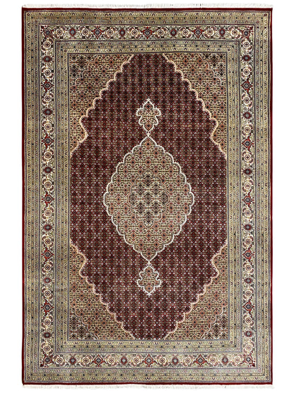 Indo Tabriz rug with medallion pattern in dark red, beige, and cream