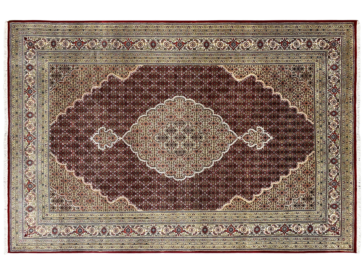 Indo Tabriz rectangular rug with central medallion and fine border design