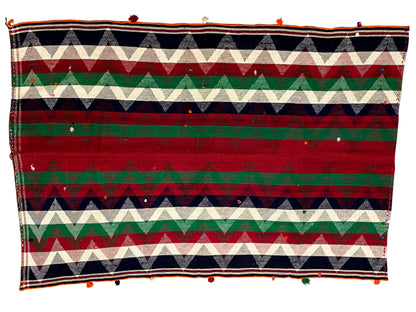 Jajim rug with a horizontal zigzag pattern in red, green, cream and dark blue