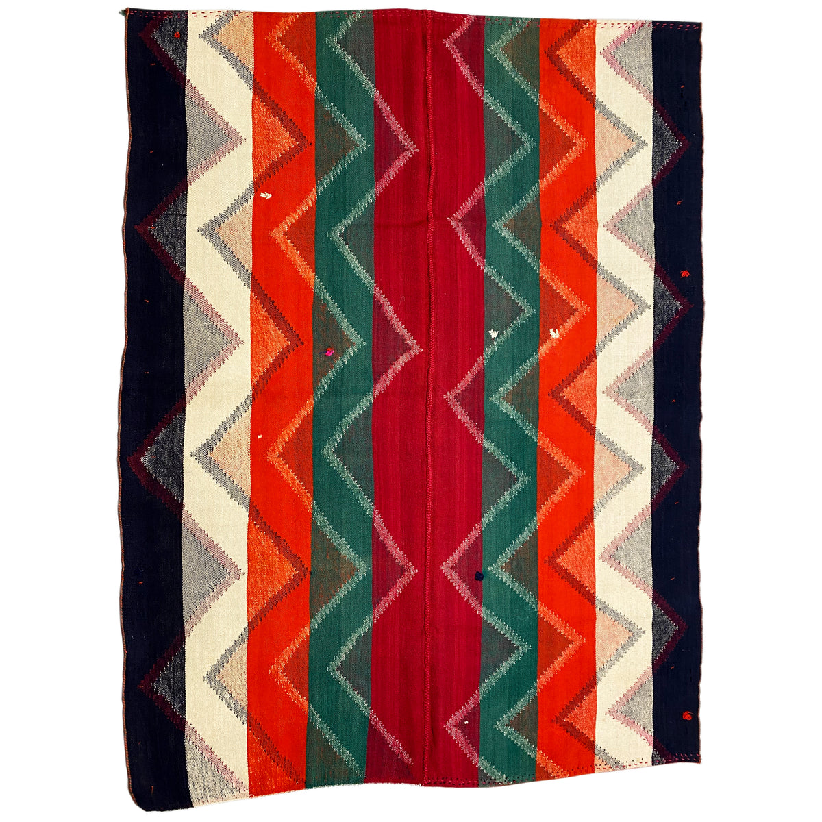 Rectangular rug with vertical stripes and a zigzag border in red, green, orange, and dark blue