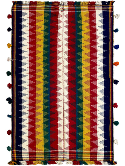 Rectangular Jajim rug with a striped pattern and colorful tassels on the sides