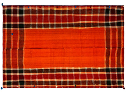 Jajim rug, top view: wide red-orange central stripe with a diamond-patterned border