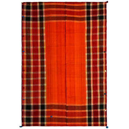 Jajim rug in red-orange with black checks and yellow-white lines, corners with blue tassels