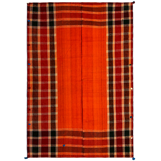 Jajim rug in red-orange with black checks and yellow-white lines, corners with blue tassels
