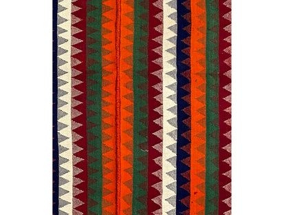 Close-up: vertical striped pattern in orange, green, blue, red, and cream