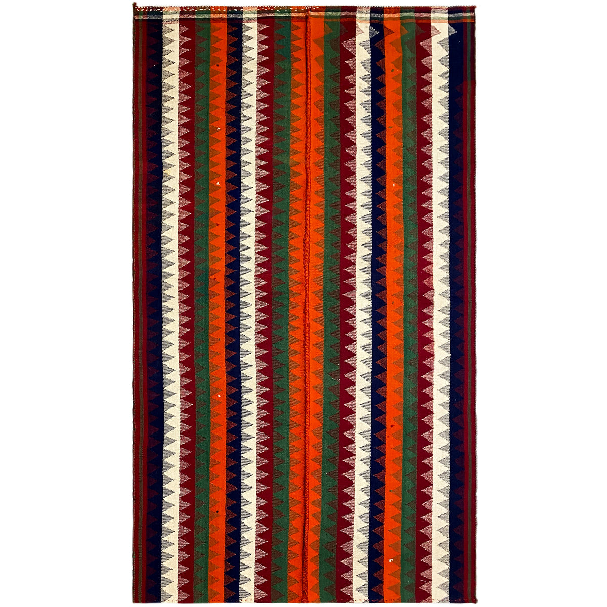 Rectangular jajim rug with a zigzag and striped pattern in green, red, blue, and cream
