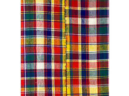 Jajim rug edge detail with fringe and multicolored checkered pattern
