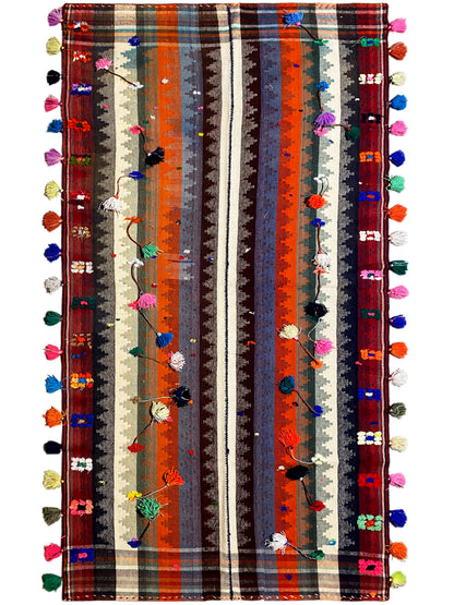 Jajim rug with orange, blue, and beige stripes and colorful tassels