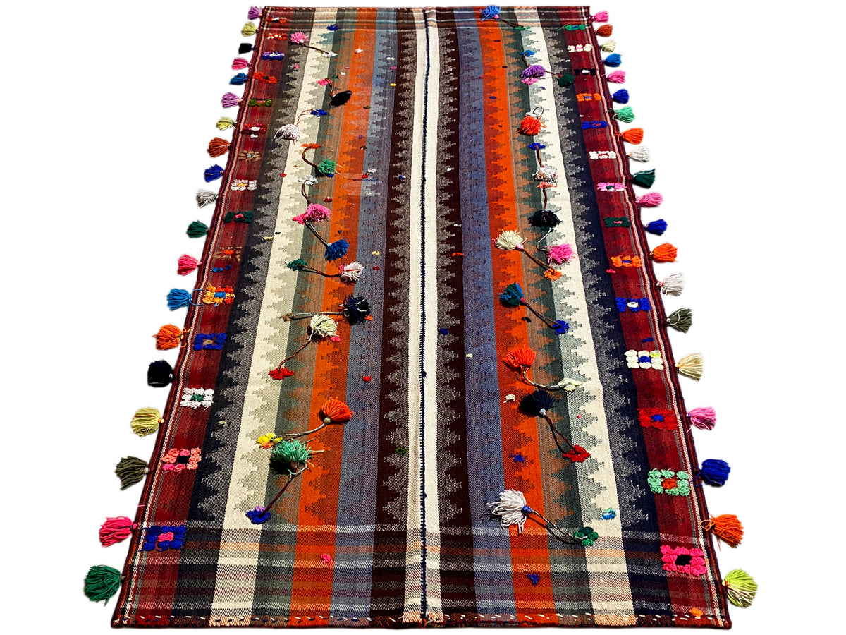 Colorful Jajim rug with vertical stripes, floral appliqués and tassels