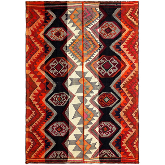 Rectangular jajim rug with diamond and zigzag patterns in red, black, and cream