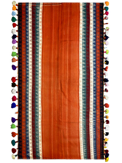 Jajim rug, rectangular, terracotta with a striped pattern and colorful tassels on the sides