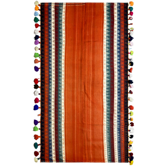 Jajim rug in terracotta with multicolored borders and colorful tassels along the edges