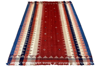 Flat-woven Oriental rug in red, beige and blue with stripes and fringed edges