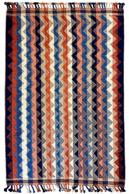 Rug with a blue, red, and beige zigzag pattern, with fringes, 219x141 cm